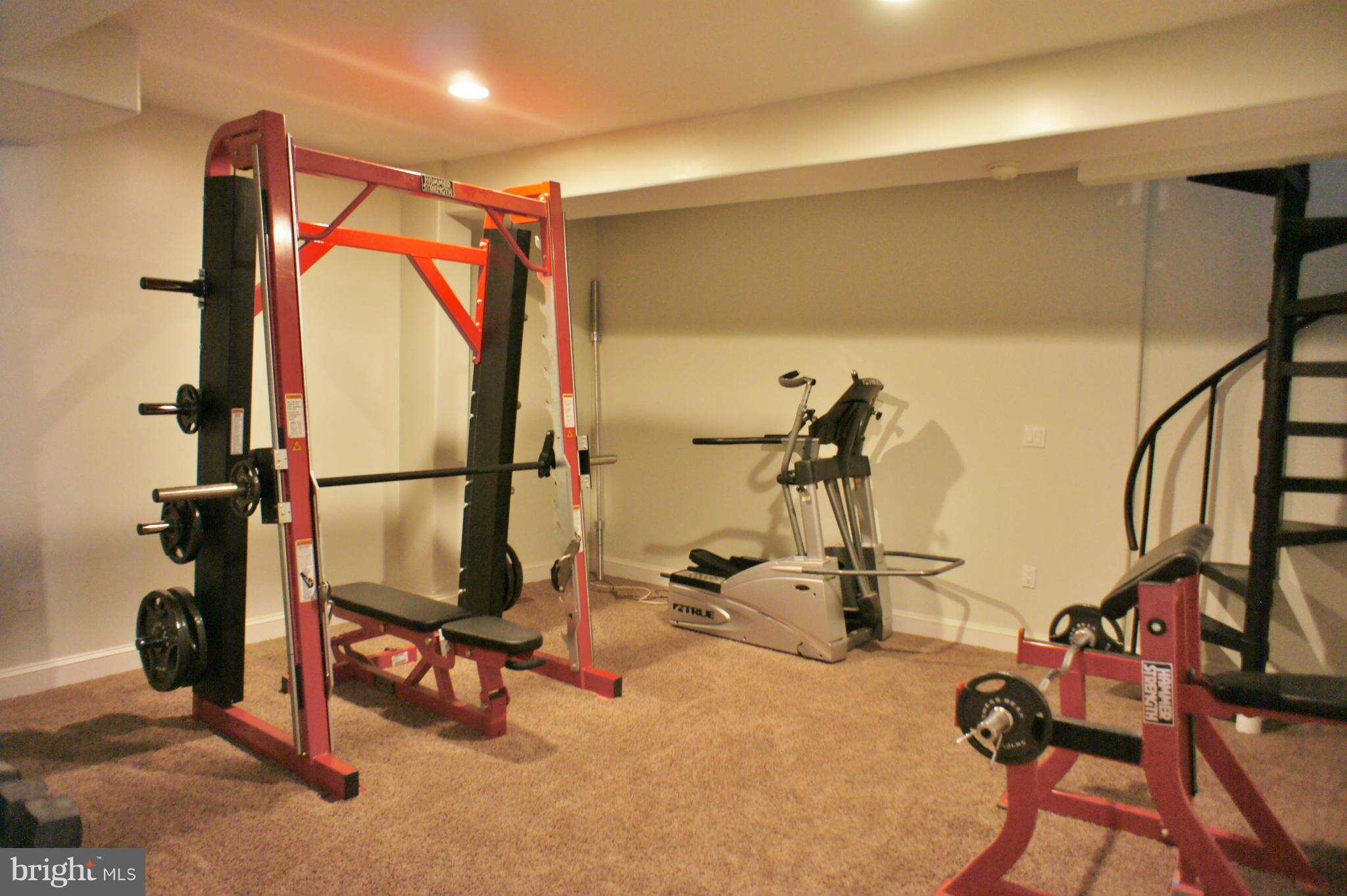 13292 Olivet Road Lusby, MD 20657 - Photo 23 of 30 LL Gym has spiral staircase access to ML!
