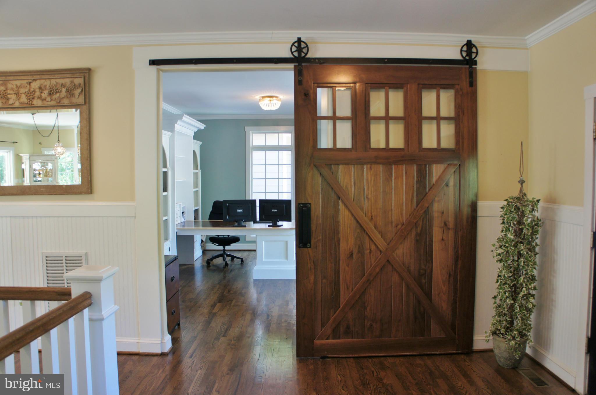 13292 Olivet Road Lusby, MD 20657 - Photo 5 of 30 Sliding barn door to office! Built in Bookcases!