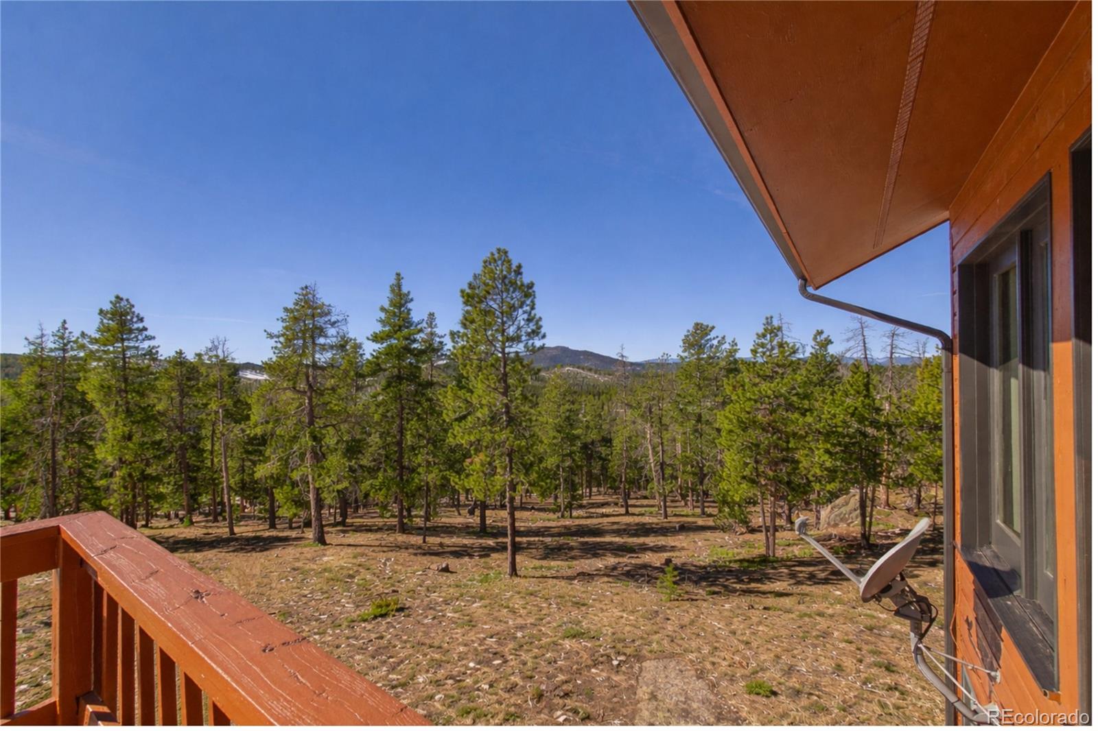 10798 Crystal Way Morrison, CO 80465 - Photo 31 of 36 a view of a backyard of the house