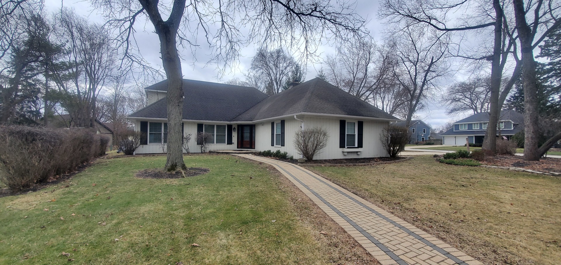 26-w055 Cree Lane Wheaton, IL 60189 - Photo 1 of 1 a front view of a house with a yard