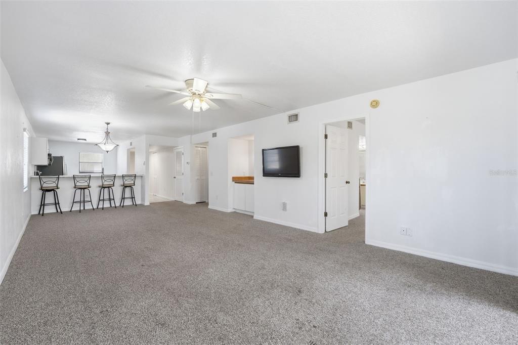 175 Kings Highway, Unit 328 Punta Gorda, FL 33983 - Photo 13 of 41 a view of a livingroom with a kitchen