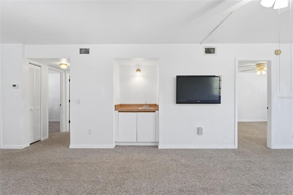 175 Kings Highway, Unit 328 Punta Gorda, FL 33983 - Photo 14 of 41 a view of a livingroom with wooden floor