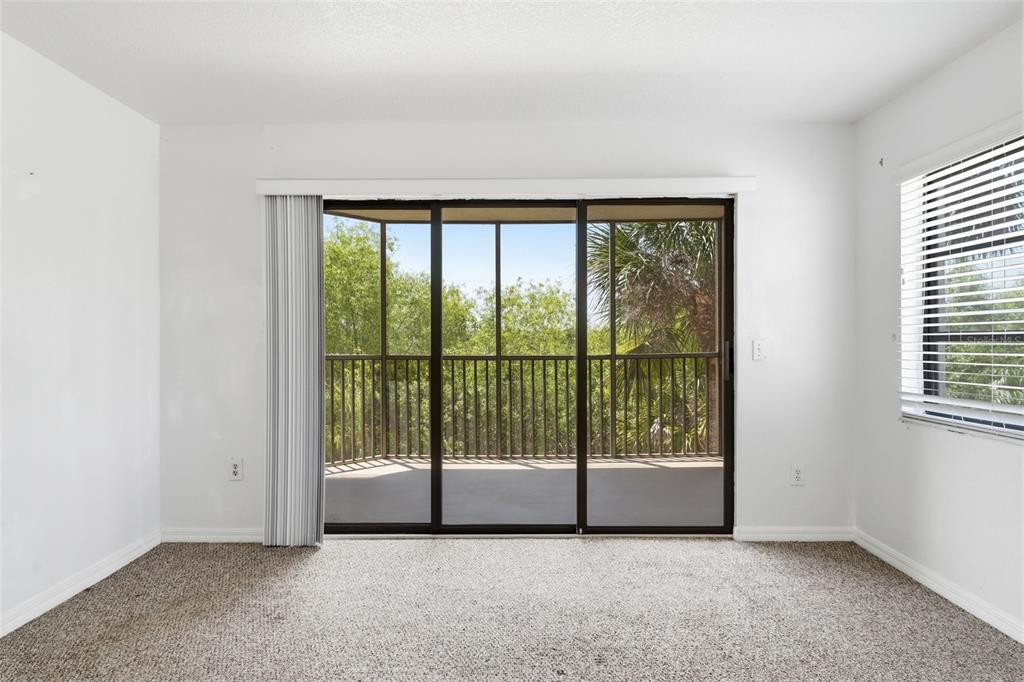 175 Kings Highway, Unit 328 Punta Gorda, FL 33983 - Photo 15 of 41 a view of an empty room with windows