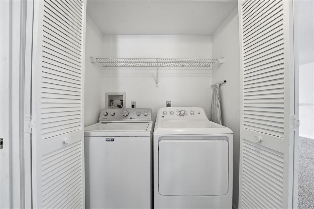 175 Kings Highway, Unit 328 Punta Gorda, FL 33983 - Photo 18 of 41 a utility room with dryer and washer
