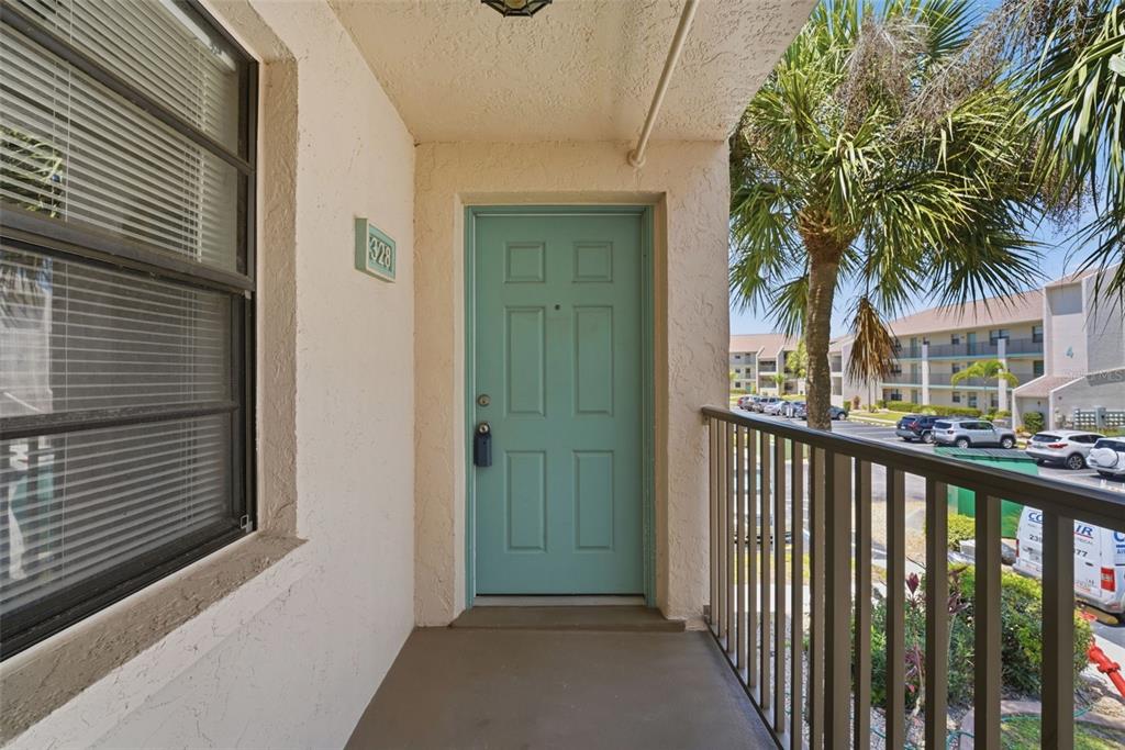 175 Kings Highway, Unit 328 Punta Gorda, FL 33983 - Photo 2 of 41 a view of a house with a porch