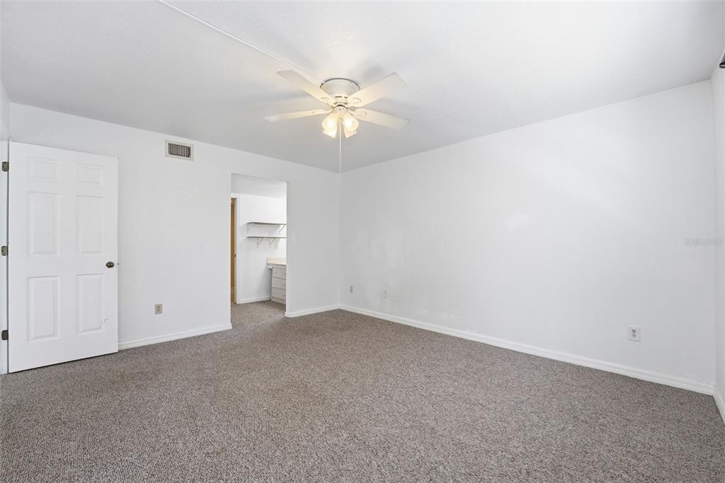 175 Kings Highway, Unit 328 Punta Gorda, FL 33983 - Photo 23 of 41 a view of an empty room with a fan