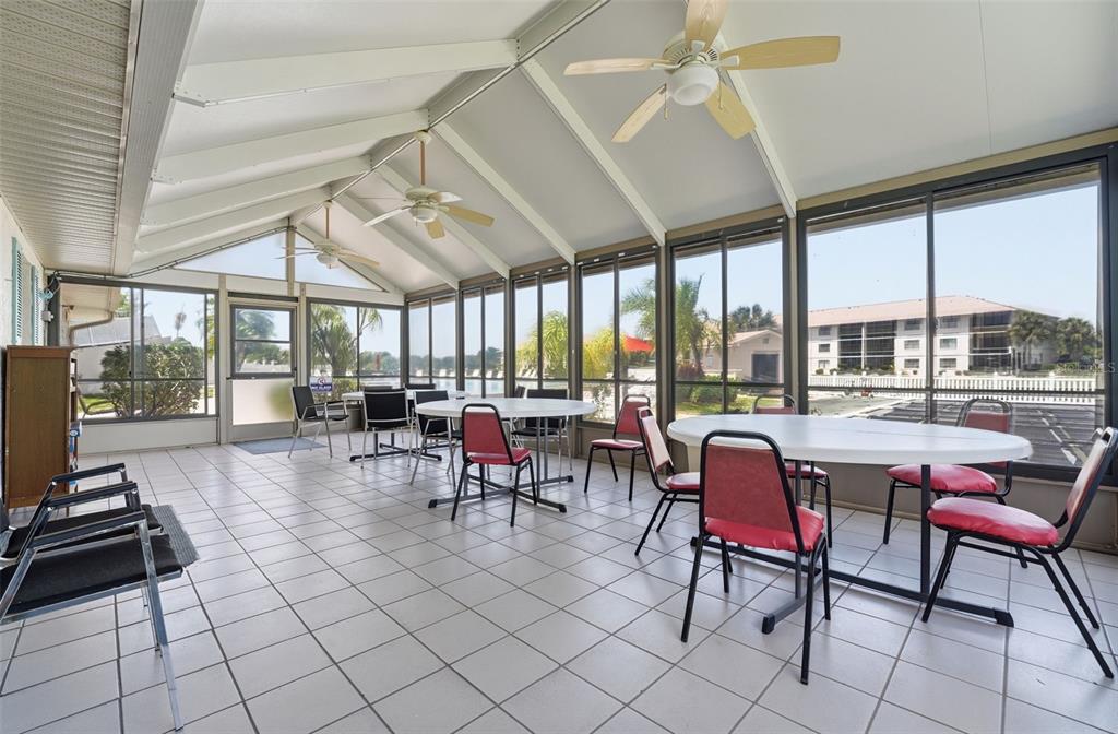 175 Kings Highway, Unit 328 Punta Gorda, FL 33983 - Photo 34 of 41 a room with lots of furniture and a large window