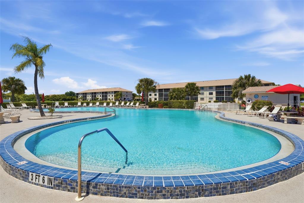 175 Kings Highway, Unit 328 Punta Gorda, FL 33983 - Photo 37 of 41 a view of a swimming pool with a patio