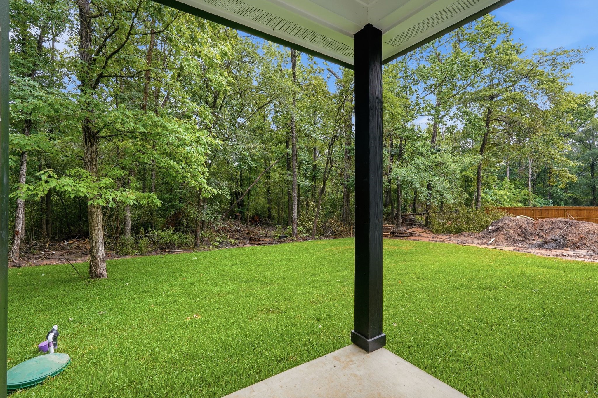 3575 Roy Bean Road Willis, TX 77378 - Photo 32 of 40 a view of a backyard with a garden