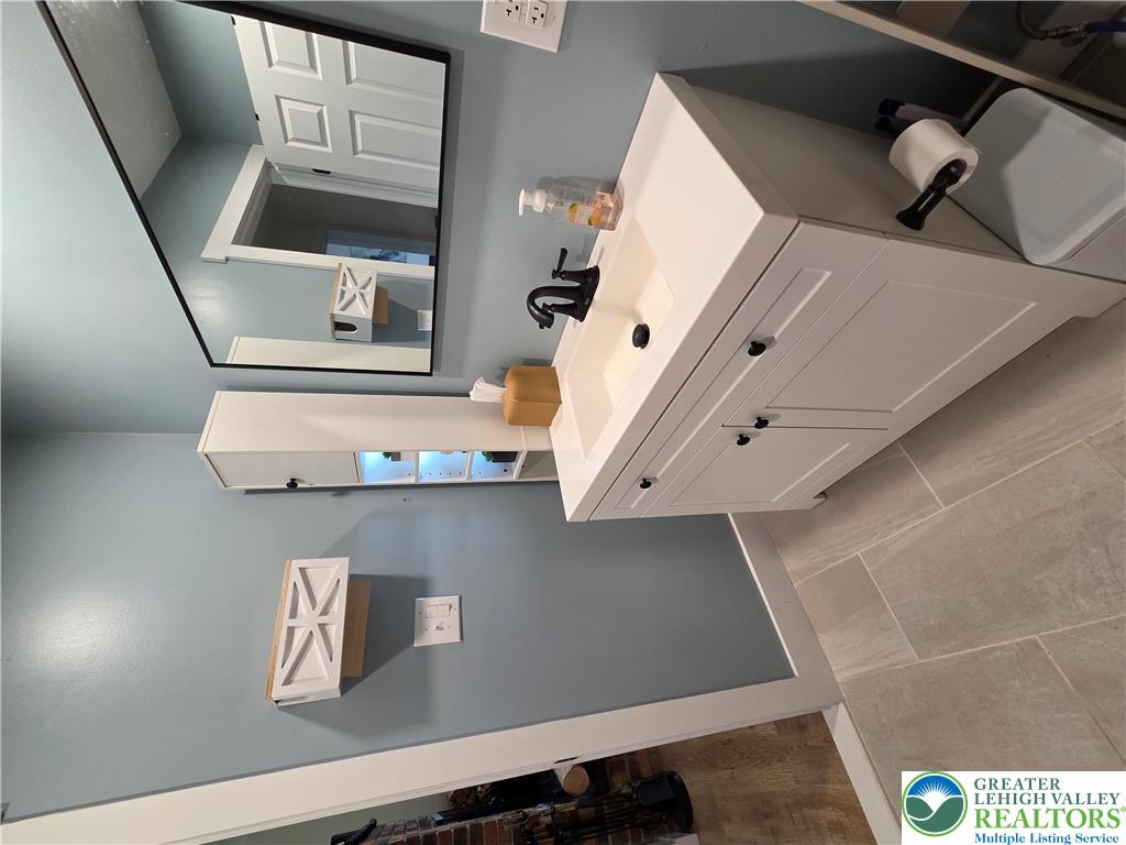 89 Short Ridge Road Albrightsville, PA 18210 - Photo 37 of 71 A stylish vanity with storage options accents this updated bathroom space.