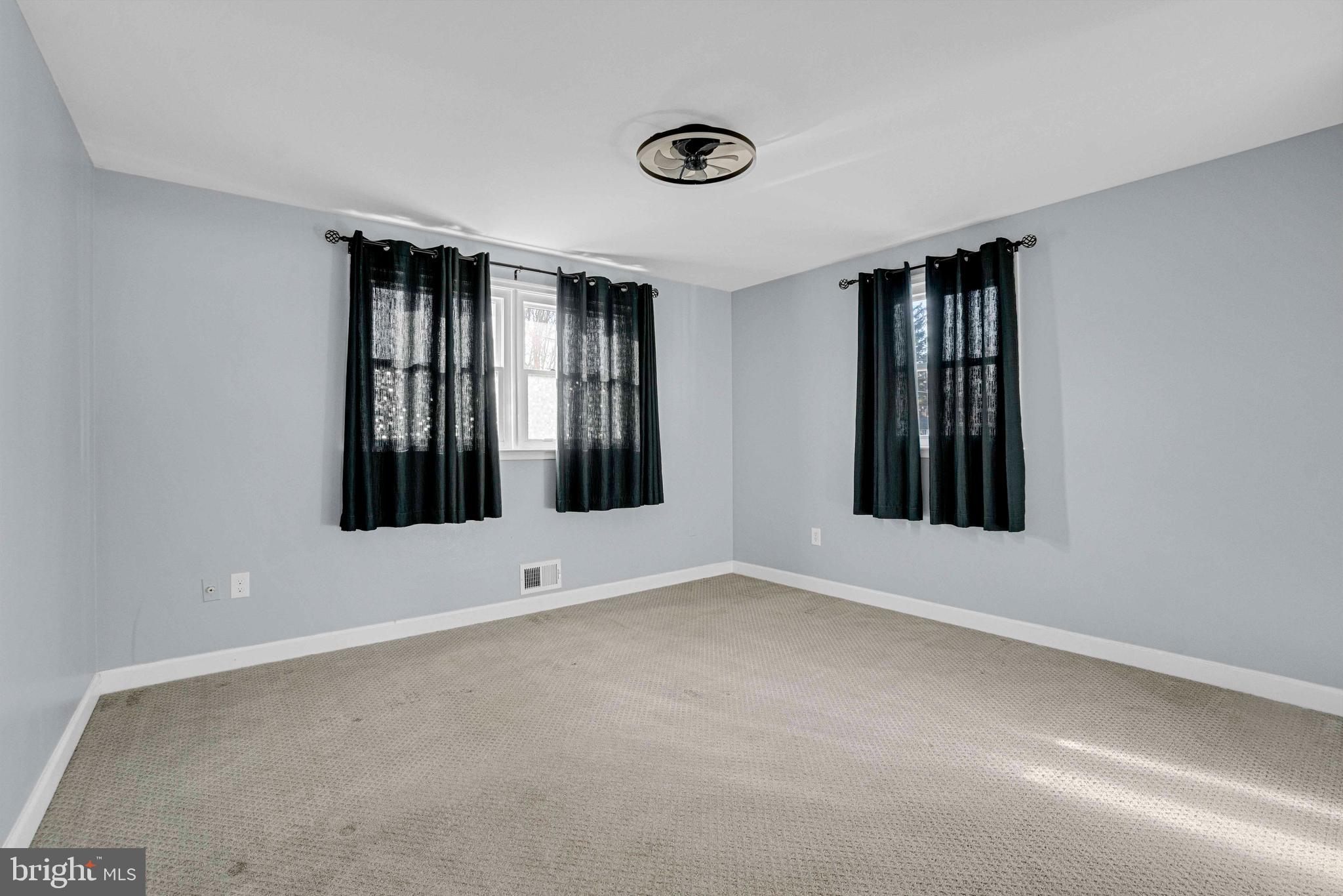 5922 Baltimore Street Baltimore, MD 21207 - Photo 14 of 33 an empty room with windows