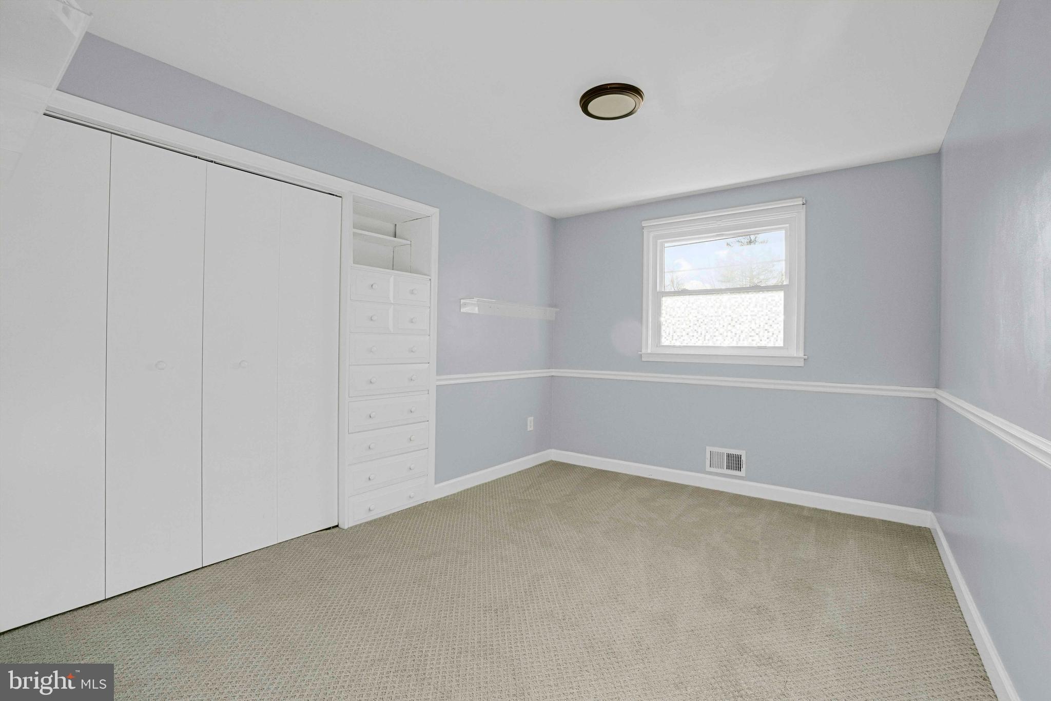 5922 Baltimore Street Baltimore, MD 21207 - Photo 17 of 33 an empty room with a window