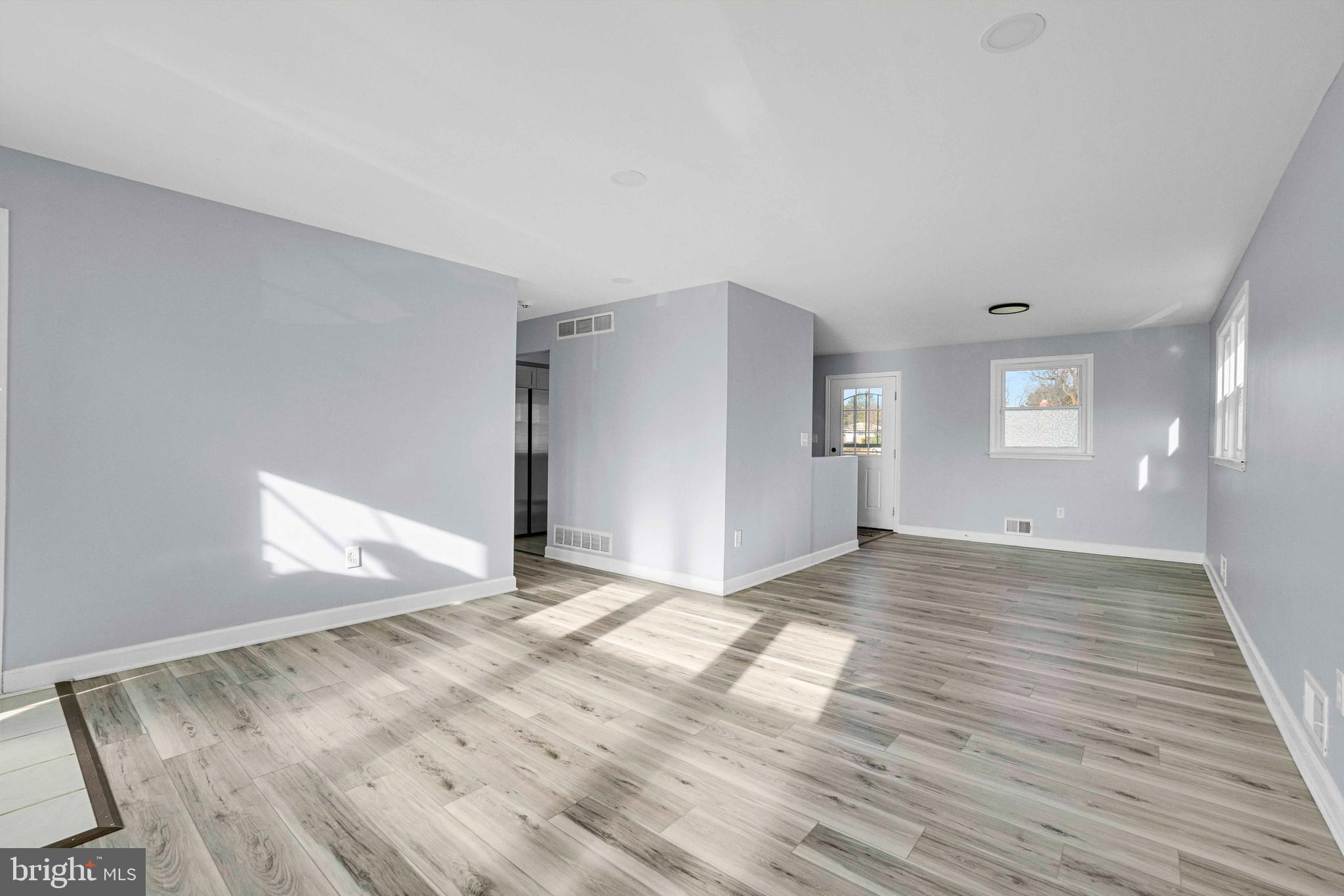 5922 Baltimore Street Baltimore, MD 21207 - Photo 5 of 33 a view of an empty room and window