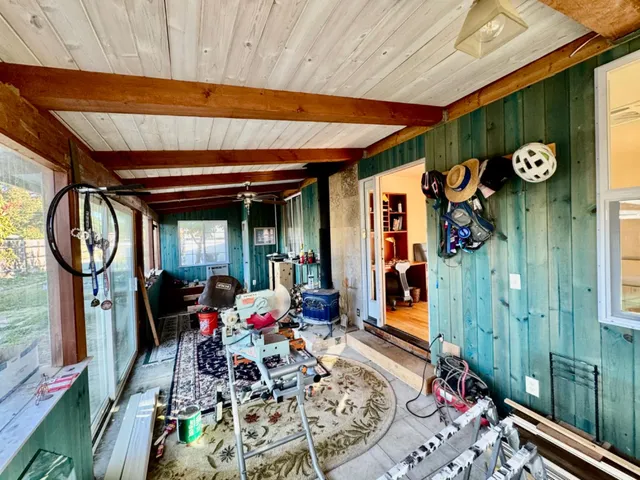a utility room with closet dryer and washer