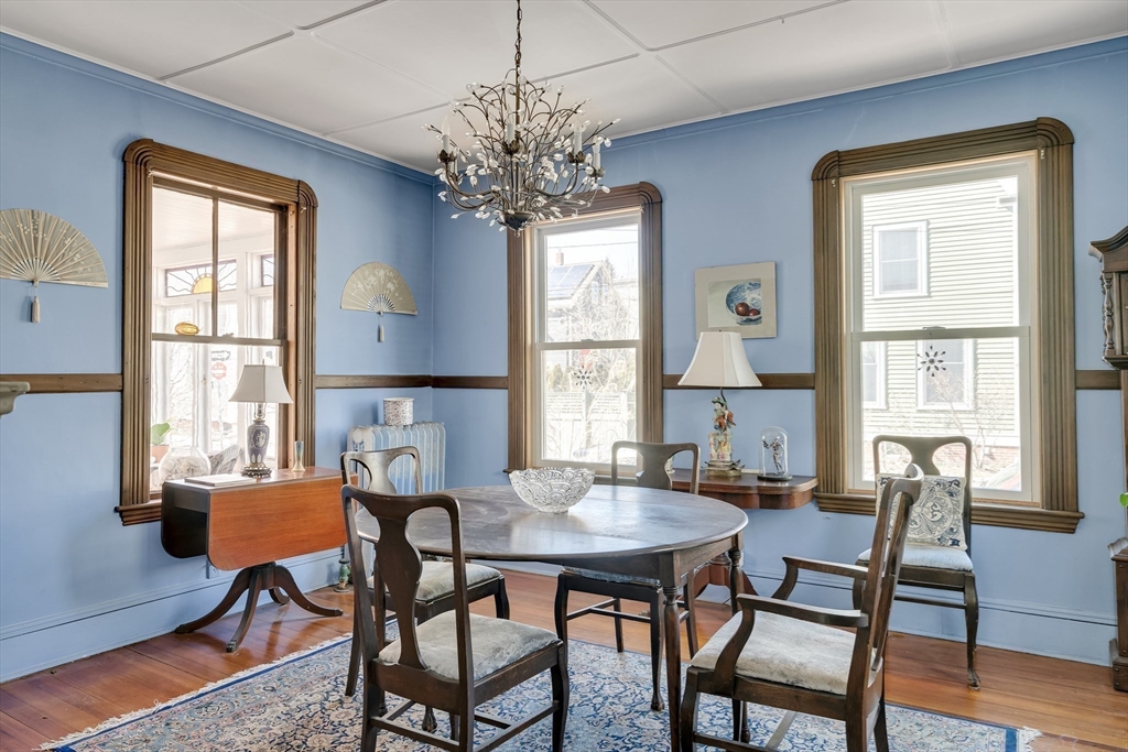 32 Locke Street Cambridge, MA 02140 - Photo 13 of 32 a view of a dining room with furniture window and wooden floor