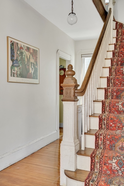 32 Locke Street Cambridge, MA 02140 - Photo 19 of 32 a view of entryway and hall with wooden floor