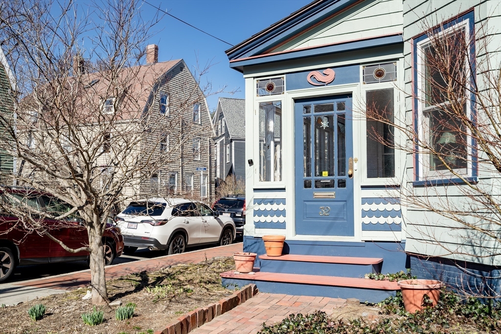 32 Locke Street Cambridge, MA 02140 - Photo 2 of 32 a front view of a building with outdoor space