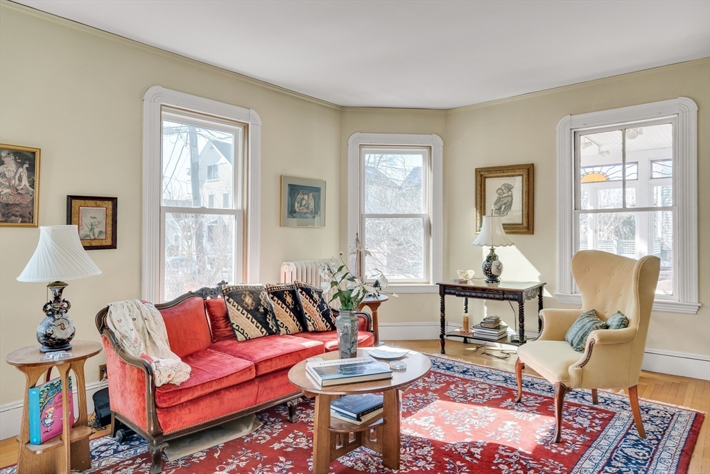 32 Locke Street Cambridge, MA 02140 - Photo 9 of 32 a living room with furniture and a window
