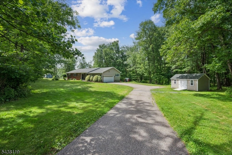 335 Drakestown Road Long Valley, NJ 07853 - Photo 3 of 34 a front view of a house with yard and green space
