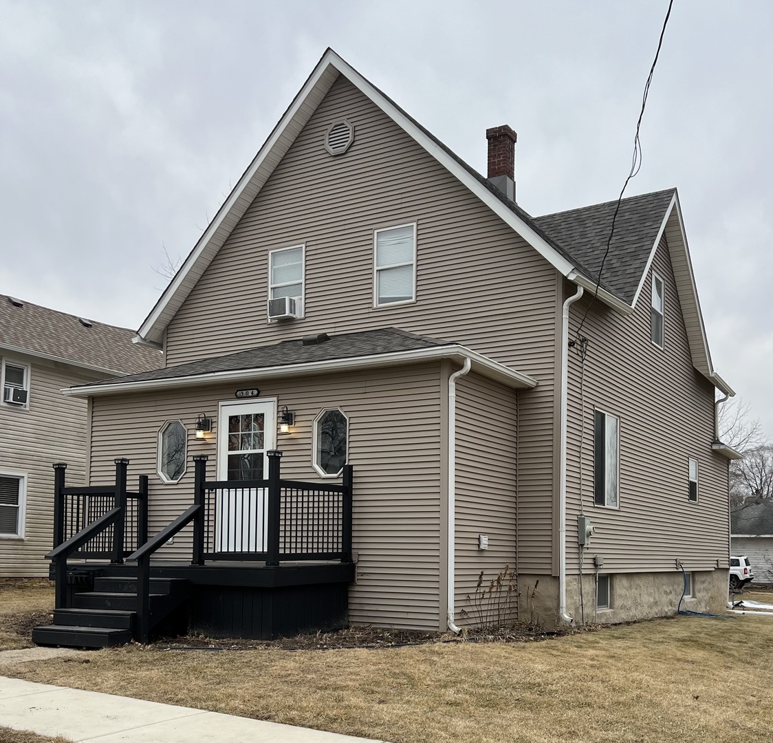 304 South 3rd Street Kirkland, IL 60146 - Photo 1 of 16 a front view of a house with stairs