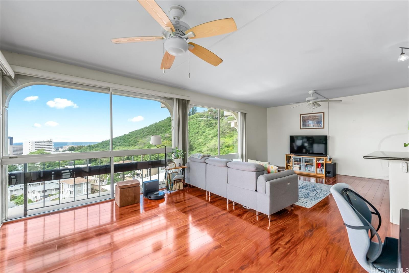1022 Prospect Street, Unit 902B Honolulu, HI 96813 - Photo 14 of 25 a living room with furniture and a flat screen tv