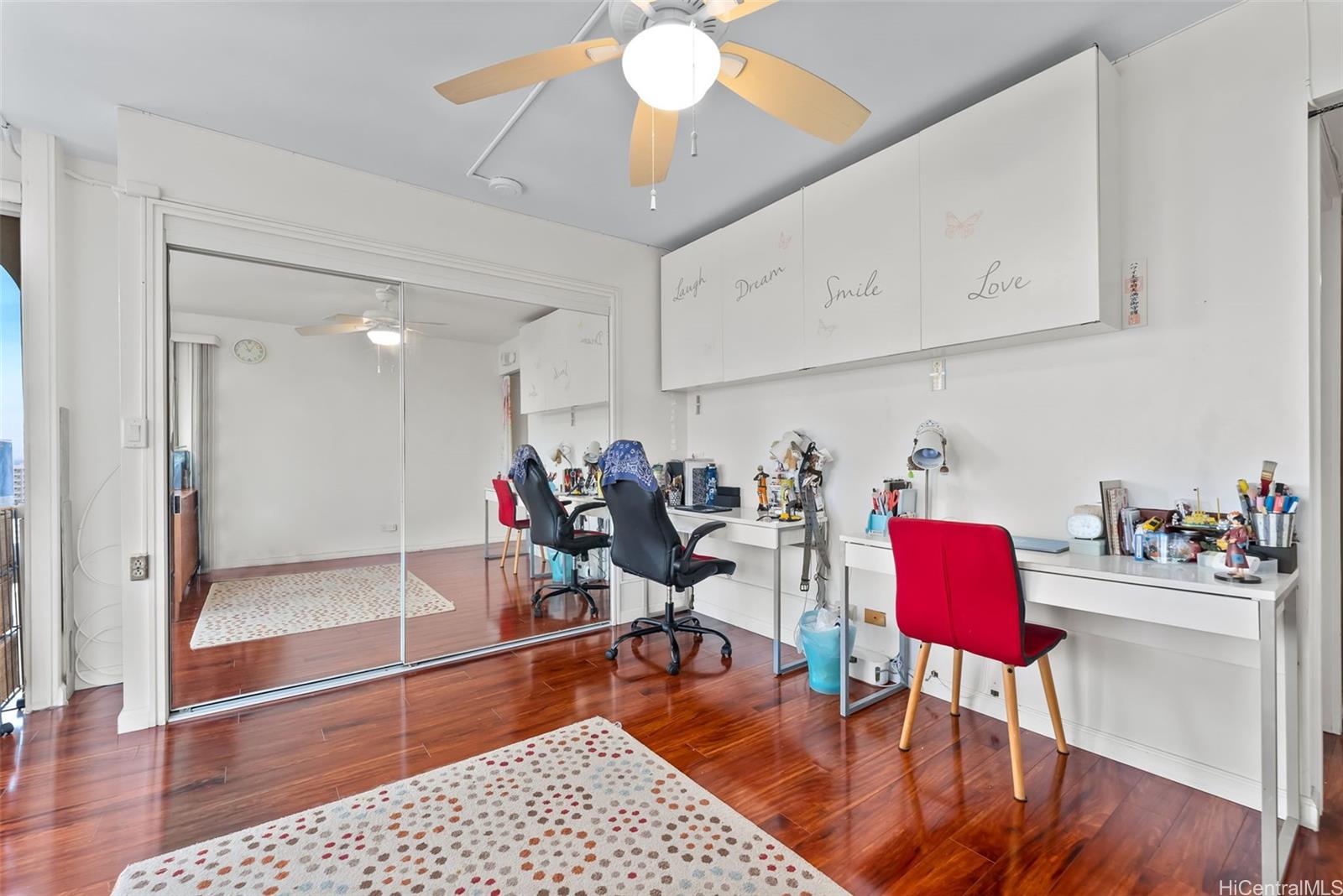 1022 Prospect Street, Unit 902B Honolulu, HI 96813 - Photo 16 of 25 a view of a dining room with furniture and wooden floor