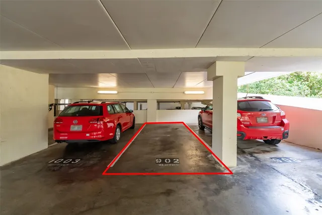 a room with wooden floor and furniture