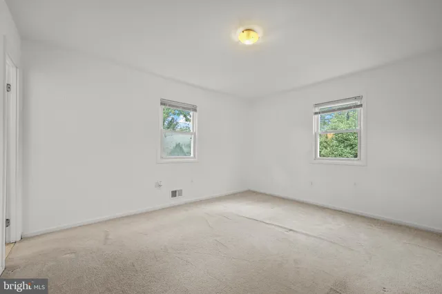 an empty room with a window