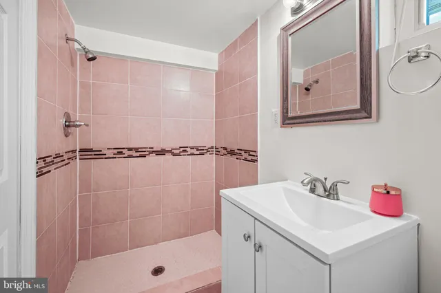 a view of deck with wooden floor and fence and trees