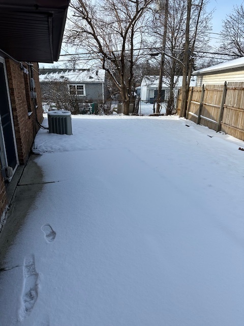 209 Andover Court Bolingbrook, IL 60440 - Photo 13 of 14 a view of a house with a snow in the yard