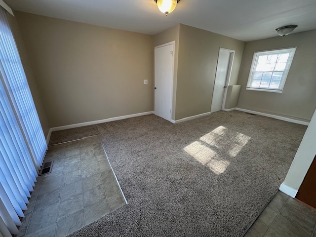 209 Andover Court Bolingbrook, IL 60440 - Photo 5 of 14 an empty room with windows