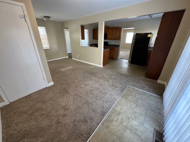 209 Andover Court Bolingbrook, IL 60440 - Photo 6 of 14 wooden floor in an empty room with a window