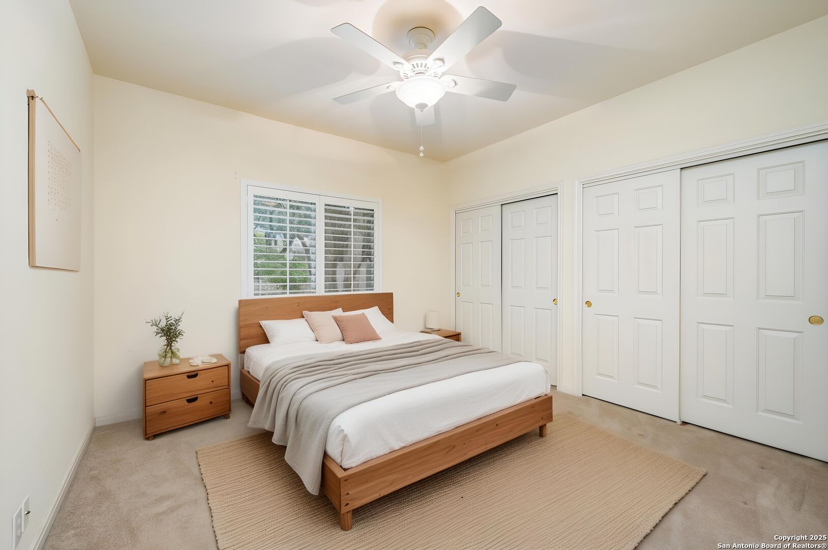3911 Heights Way San Antonio, TX 78230 - Photo 17 of 22 a bedroom with a bed and a chandelier