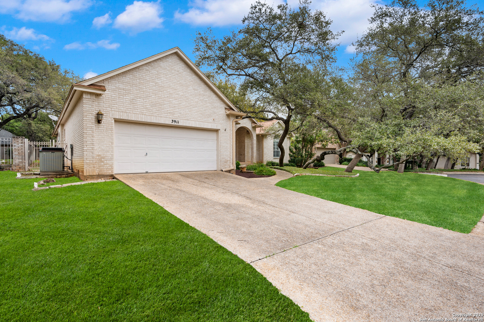 3911 Heights Way San Antonio, TX 78230 - Photo 21 of 22 a front view of house with yard and green space