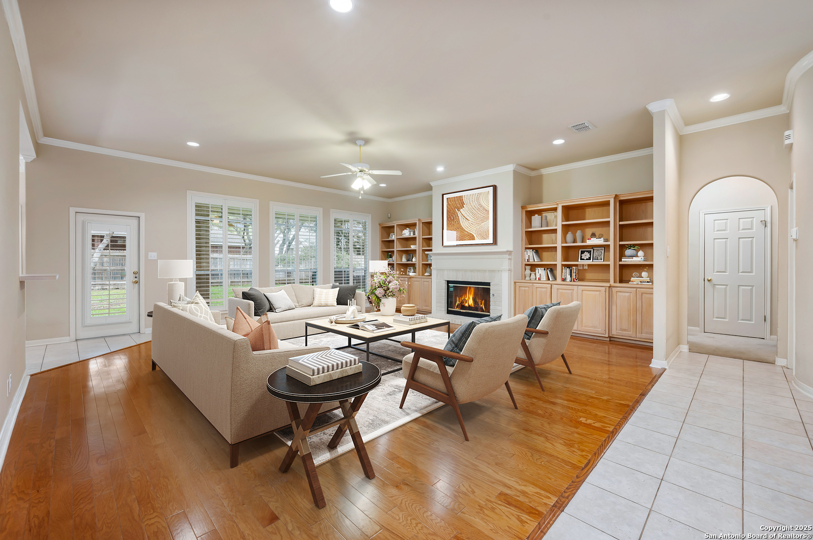 3911 Heights Way San Antonio, TX 78230 - Photo 4 of 22 a living room with fireplace furniture and a wooden floor