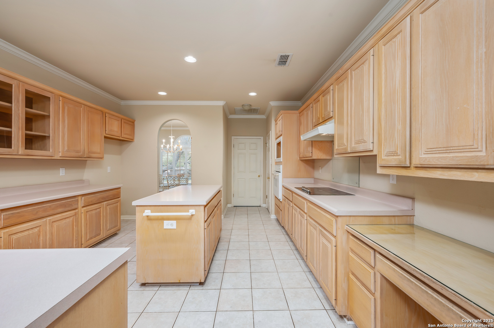 3911 Heights Way San Antonio, TX 78230 - Photo 9 of 22 a kitchen with stainless steel appliances granite countertop a sink and cabinets