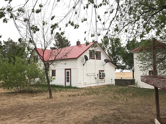 8750 Berridge Road Calhan, CO 80808 - Photo 1 of 4 Northwest view of main house.
