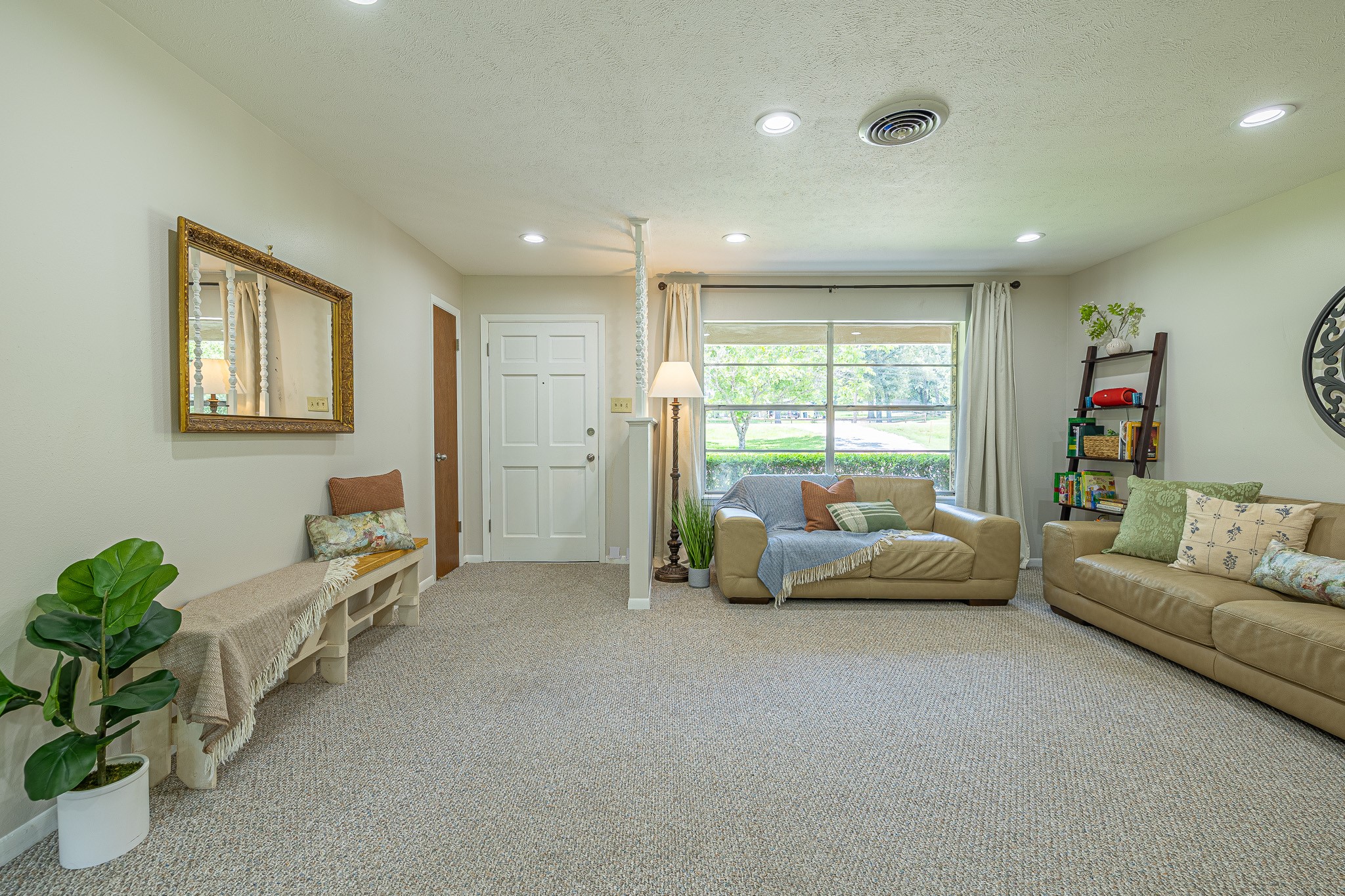 1009 Fish Hatchery Road Huntsville, TX 77320 - Photo 6 of 16 a living room with furniture and a large window