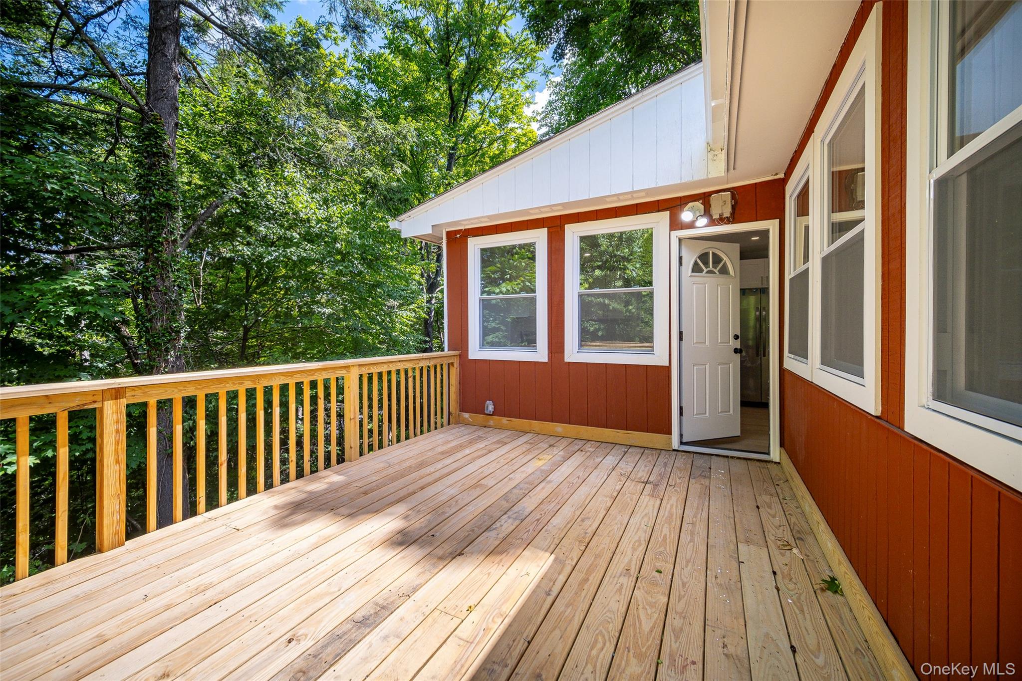 219 Benedict Road Montgomery, NY 12549 - Photo 39 of 50 a view of backyard with deck and wooden floor