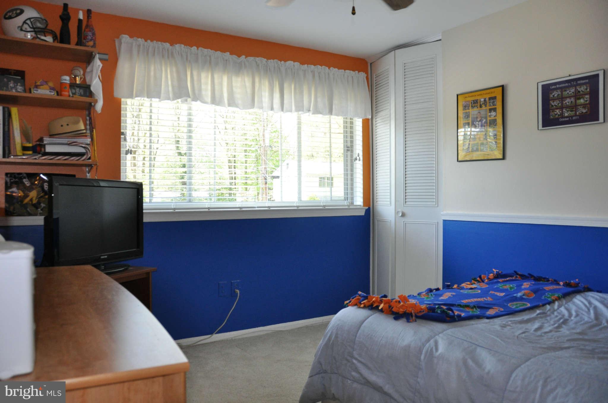 5507 Yorkshire Street Springfield, VA 22151 - Photo 20 of 26 a bedroom with a bed and a window