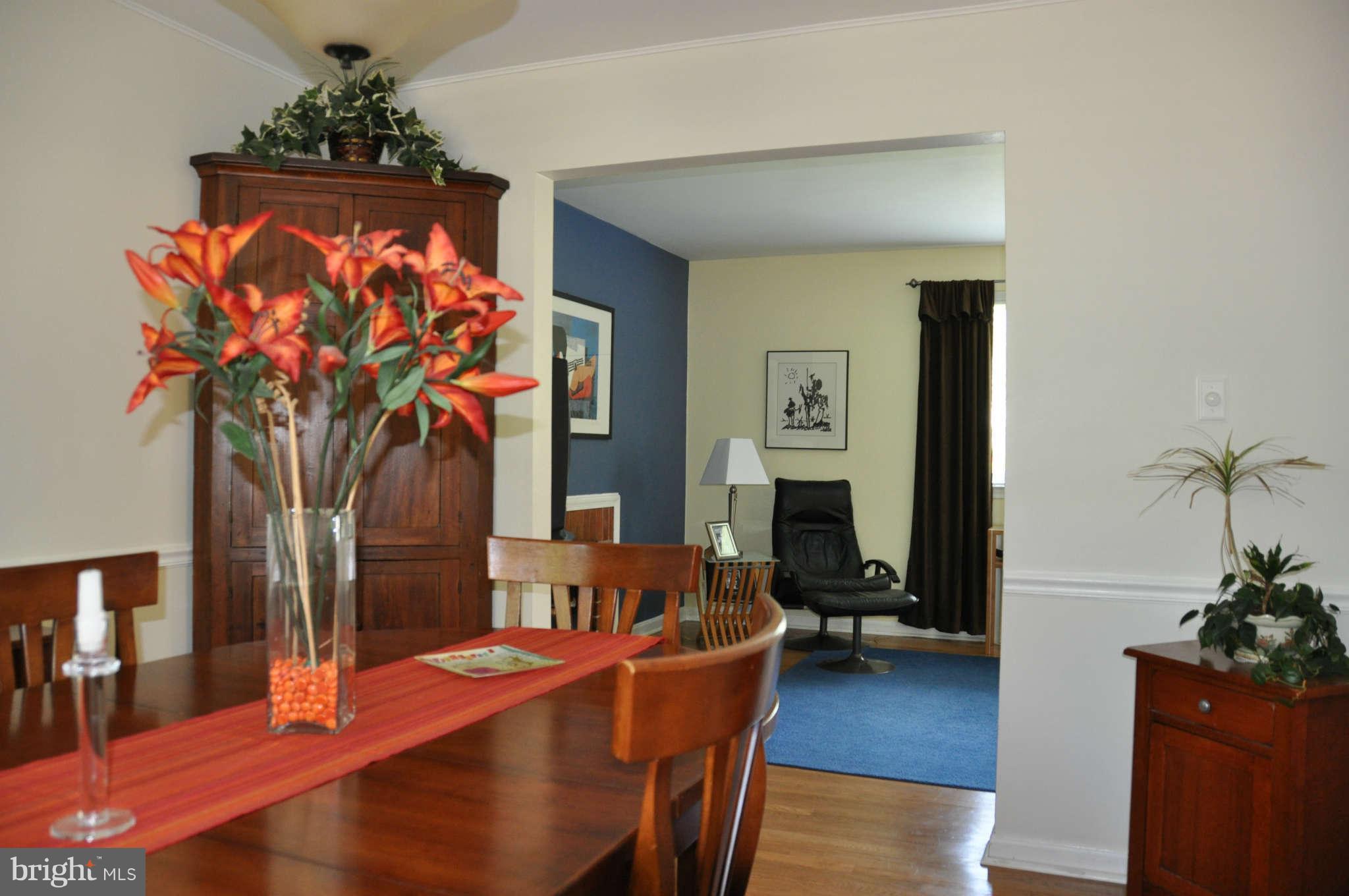 5507 Yorkshire Street Springfield, VA 22151 - Photo 7 of 26 a dining room with furniture and wooden floor