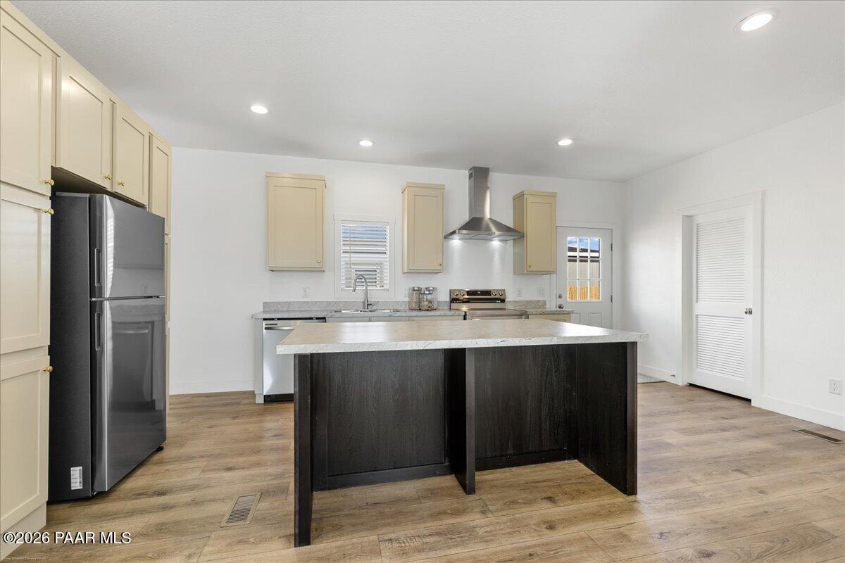 65 Hawaii Road Paulden, AZ 86334 - Photo 3 of 29 a view of kitchen with stainless steel appliances granite countertop a refrigerator and a sink