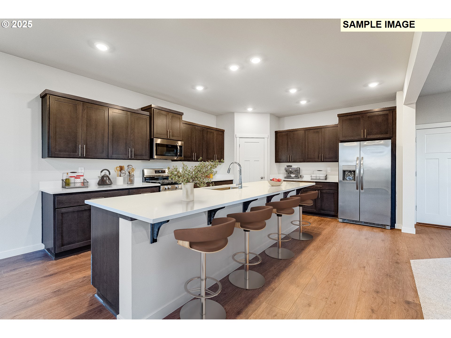 5893 Bainbridge Road Eugene, OR 97402 - Photo 4 of 22 a kitchen with cabinets a sink a counter top space stainless steel appliances and cabinets