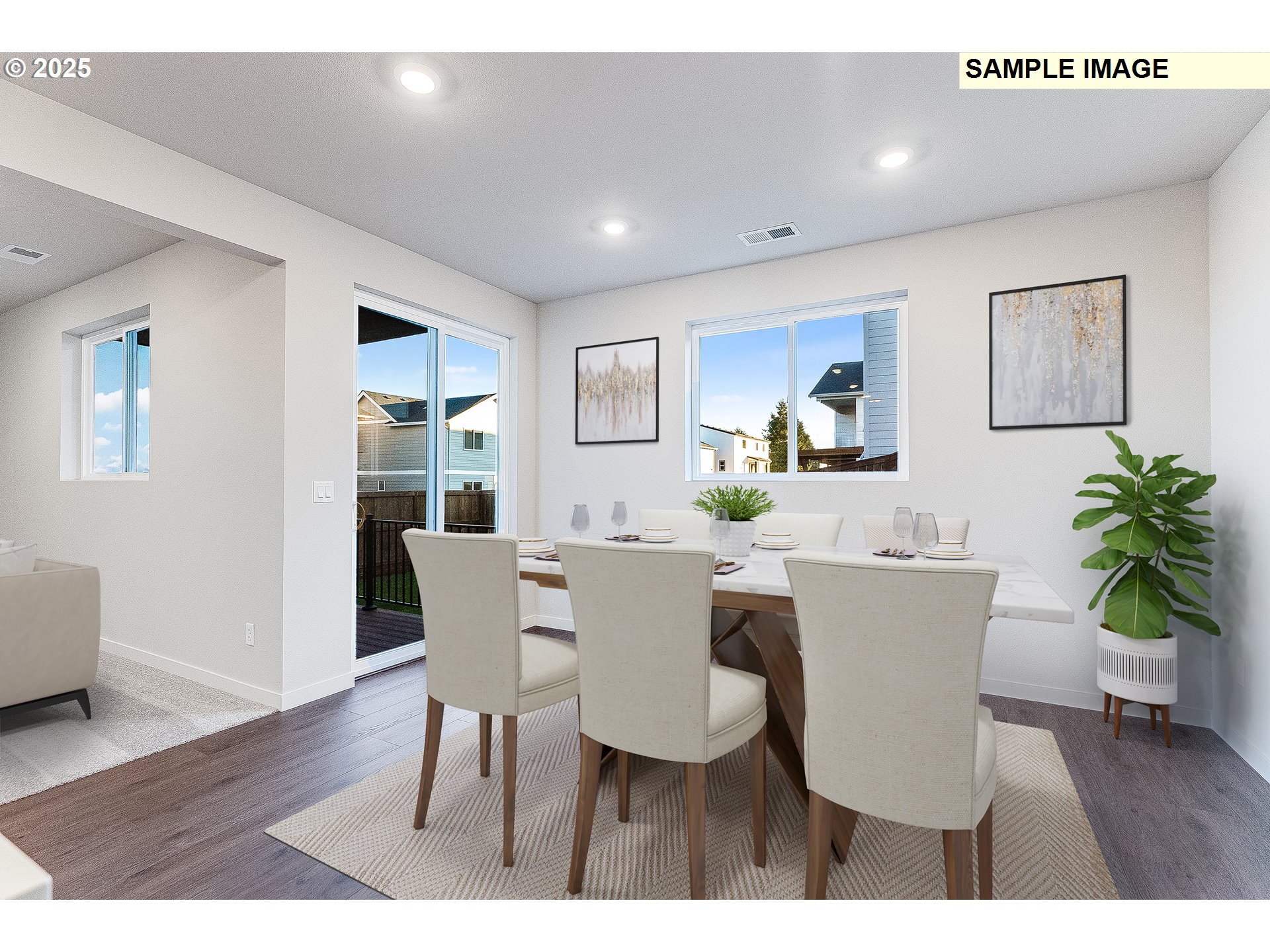 5893 Bainbridge Road Eugene, OR 97402 - Photo 5 of 22 a view of a dining room with furniture and wooden floor