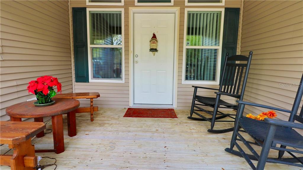 4873 Old Ranch Road Sarasota, FL 34241 - Photo 32 of 49 Front porch and front door