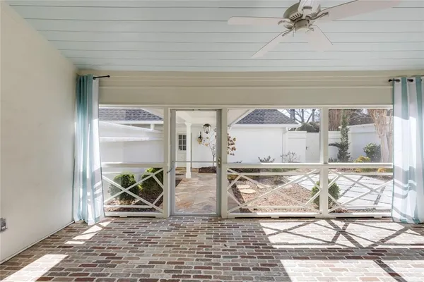 a view of a livingroom with furniture wooden floor and a rug