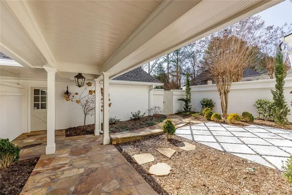 a house with trees in front of it