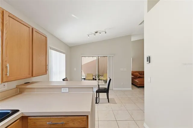 a view of kitchen with breakfast area