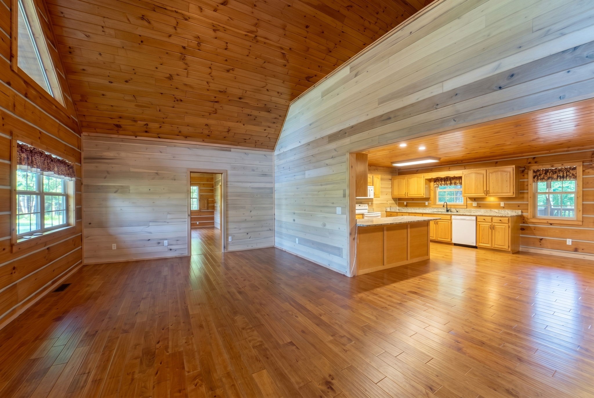 2909 B Beech Log Road Watertown, TN 37184 - Photo 34 of 67 a view of a kitchen with wooden floor and a kitchen