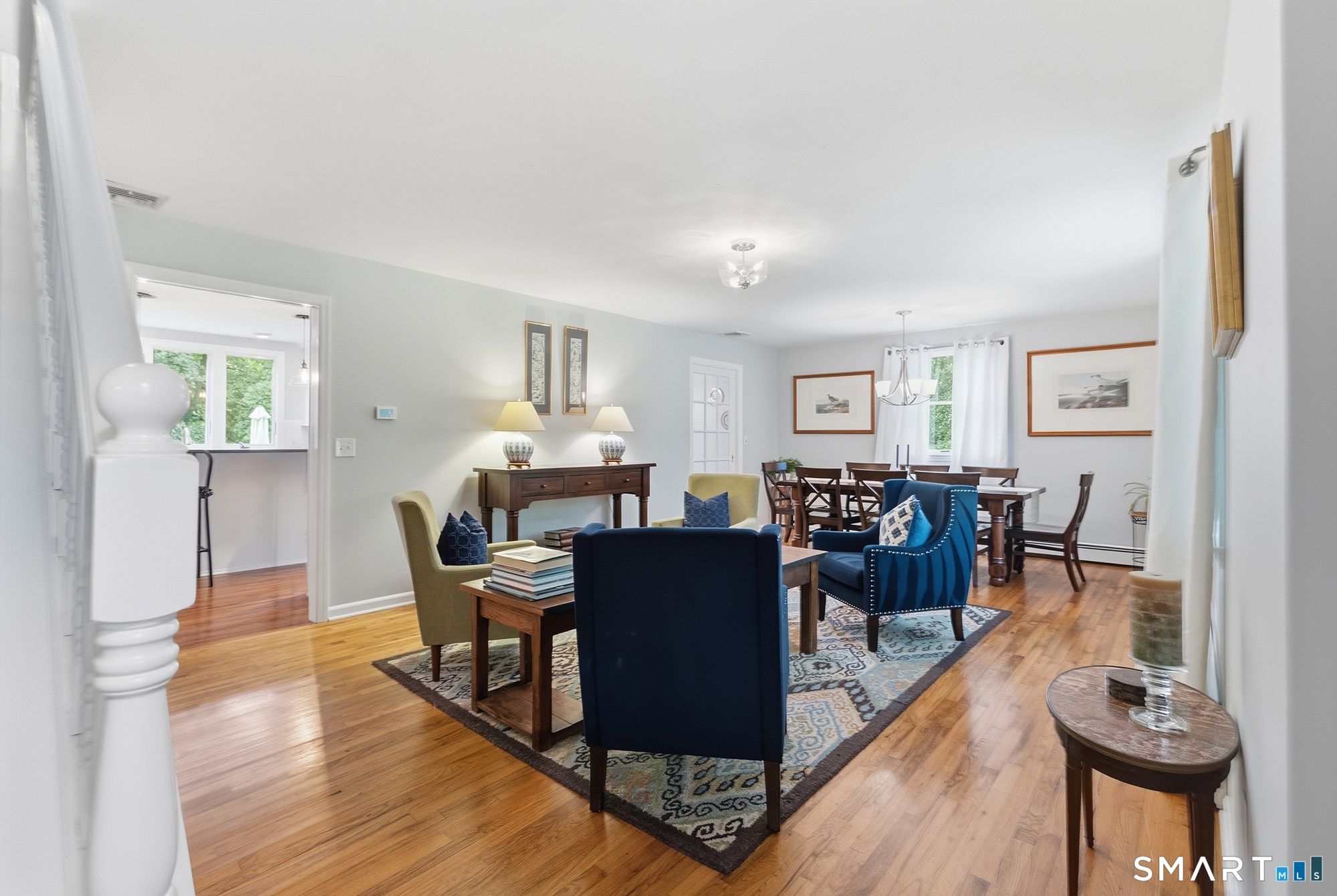 40 Ivy Hill Road Ridgefield, CT 06877 - Photo 2 of 38 Spacious living room and dining room combo with gleaming hardwood floors.